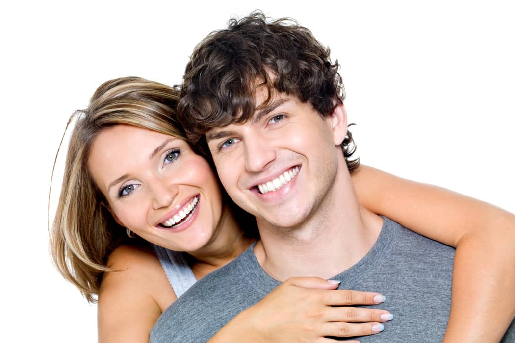 Young couple smiling after LASIK